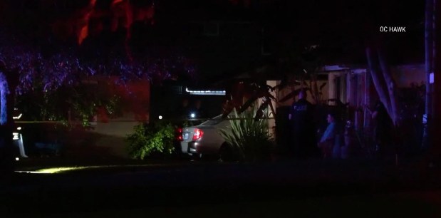 Orange police and firefighters responded to the 600 block of South Fashion Park Street after a man allegedly drove a car up a curb, struck a pedestrian and ended up partially into an apartment building on Saturday, June 13. (Photo by OC Hawk)