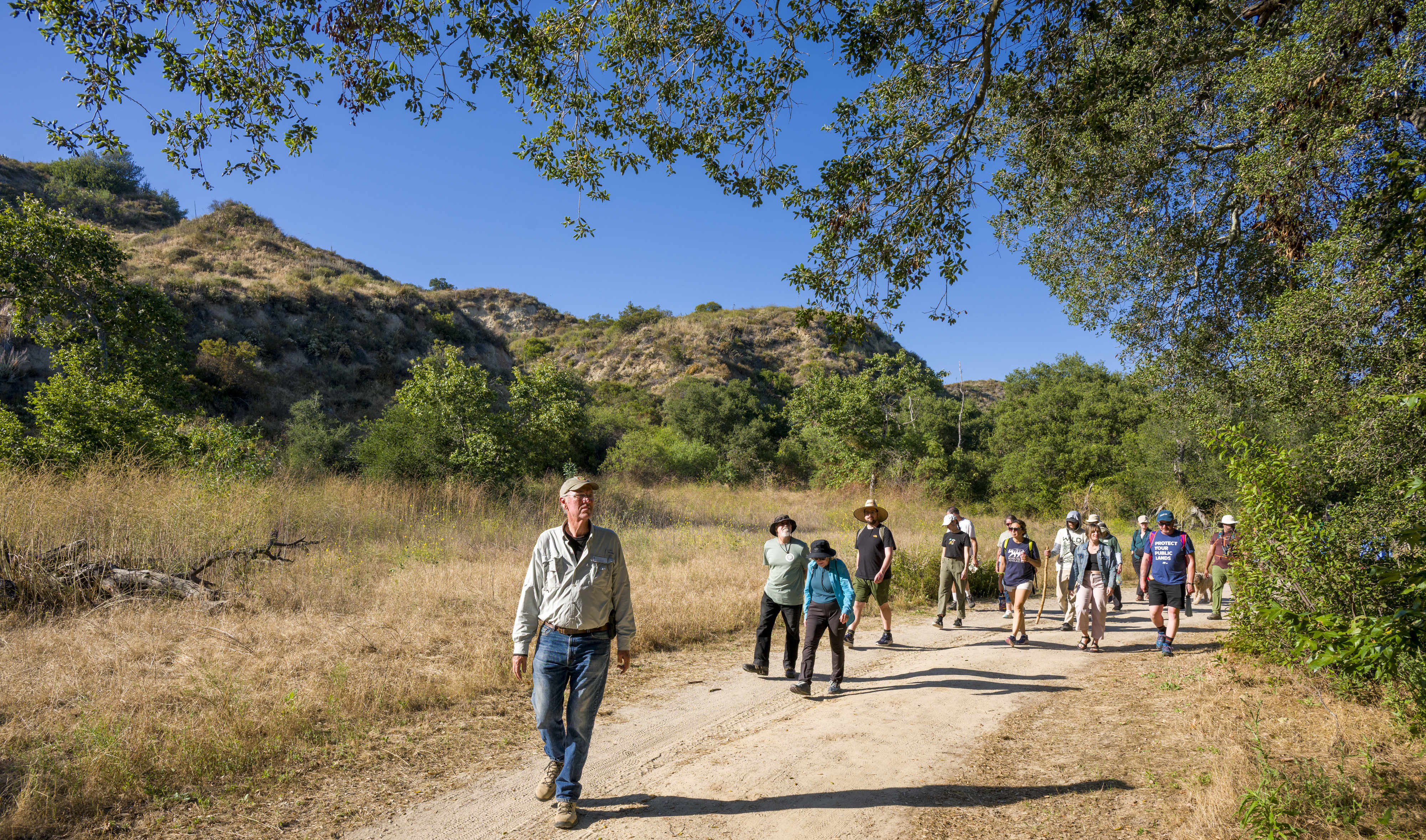 Ron Vanderhoff of the California Native Plant Society, left, leads...