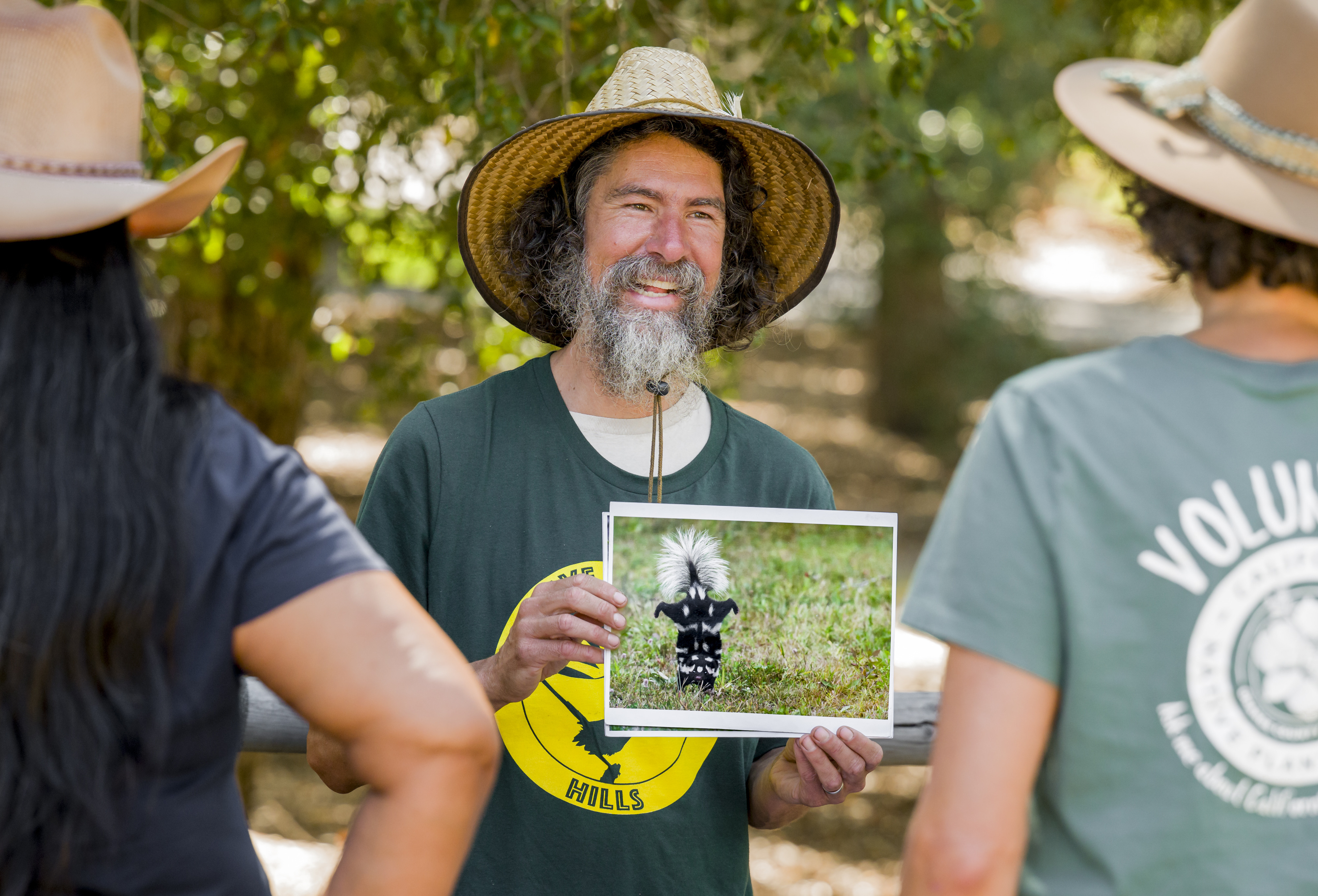 Joel Robinson, Naturalist For You and Save Orange Hills, center,...