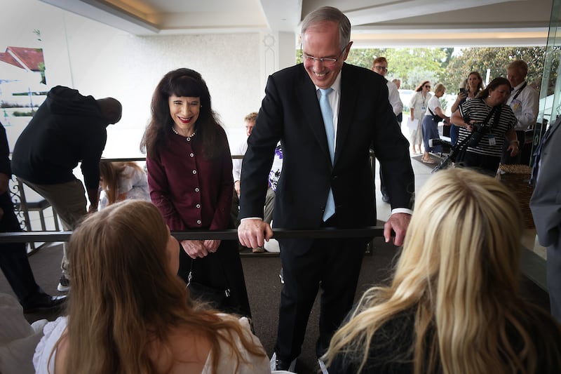 Elder Neil L. Andersen of the Quorum of the Twelve Apostles and his wife, Sister Kathy Andersen, talk with youth members during media day at the San Diego California Temple on Monday, June 15, 2026.