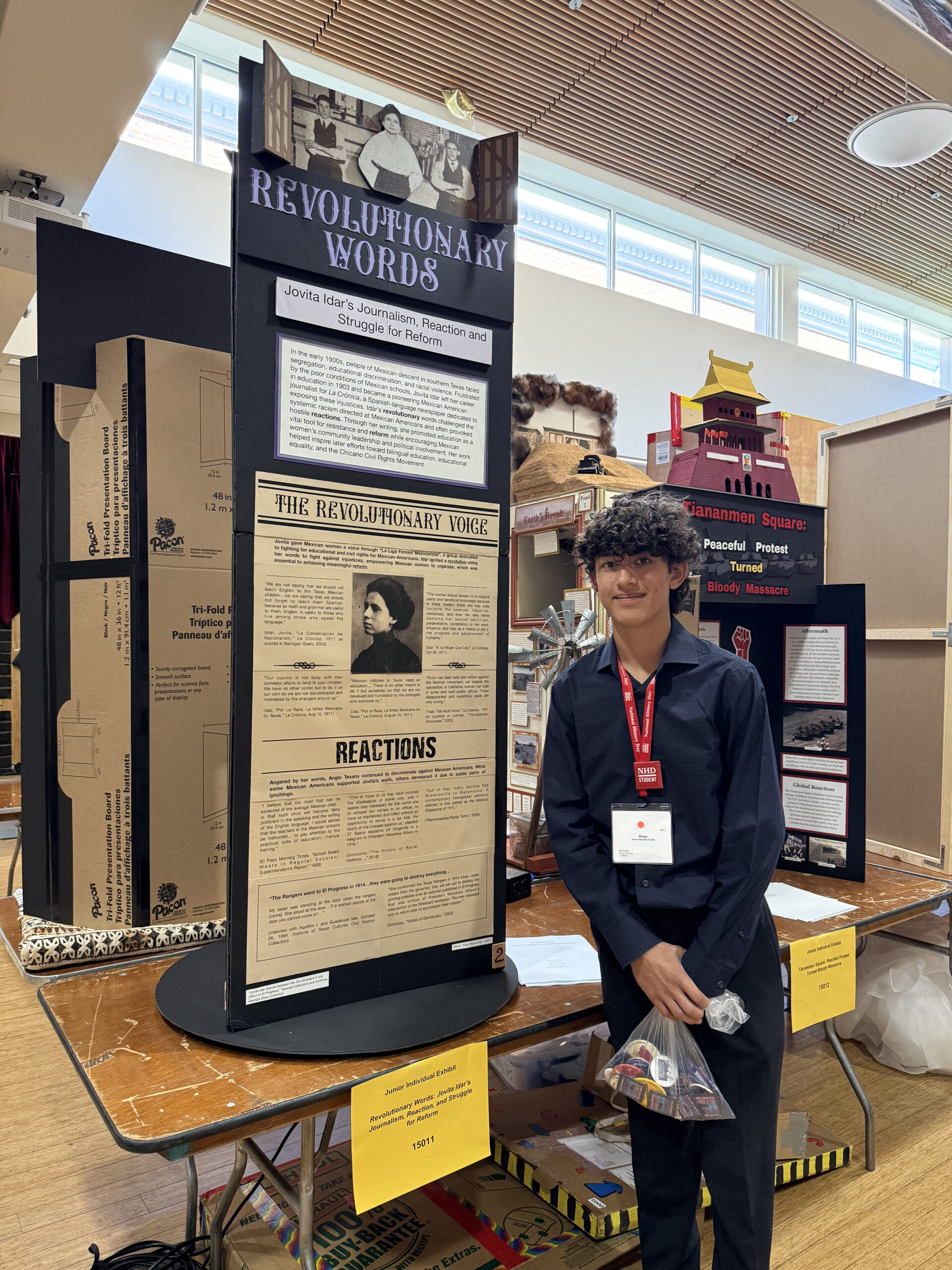 Sierra Vista Middle School student Oliver Wiechmann stands beside his exhibit, “Revolutionary Words: Jovita Idar’s Journalism, Reaction, and Struggle for Reform,” at the 2026 National History Day National Contest at the University of Maryland.
