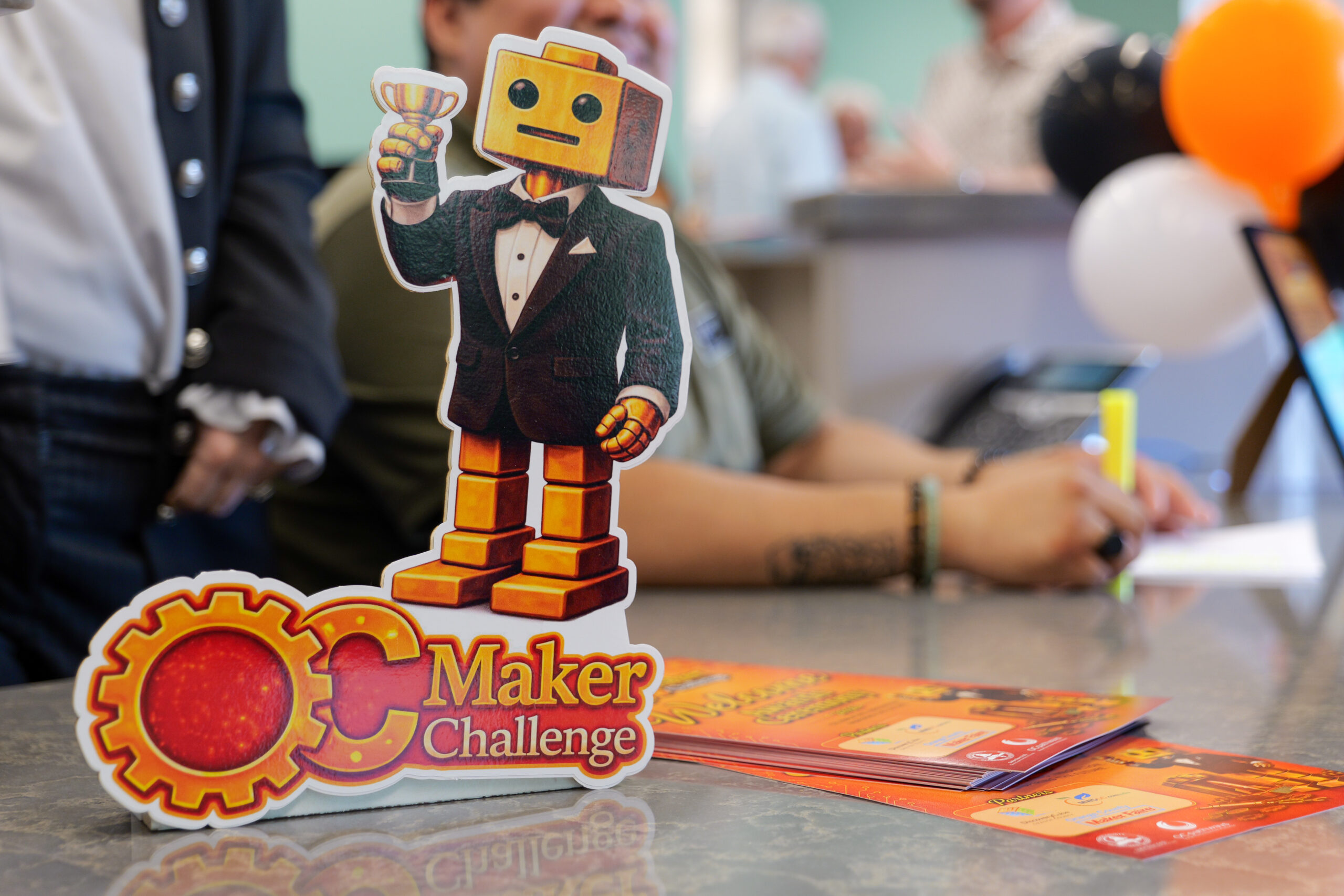 OCDE staff welcome students, families and educators to the ocMaker Challenge awards ceremony in May.