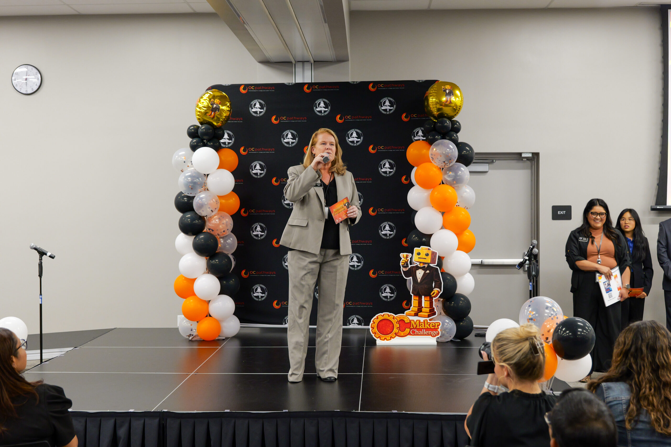 Kathy Boyd, OCDE executive director of career education and workforce development, introduces students and families to the annual ocMaker Challenge awards ceremony.
