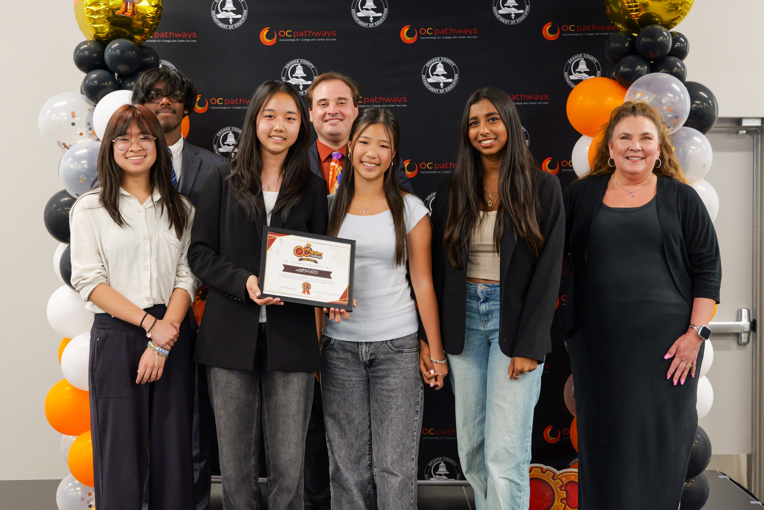 Tustin Legacy Magnet Academy students Meghan, Nora, Ella and Maiya receive second place at the high school grade level for their dynamic and functional prototype called "iLIGHTS."