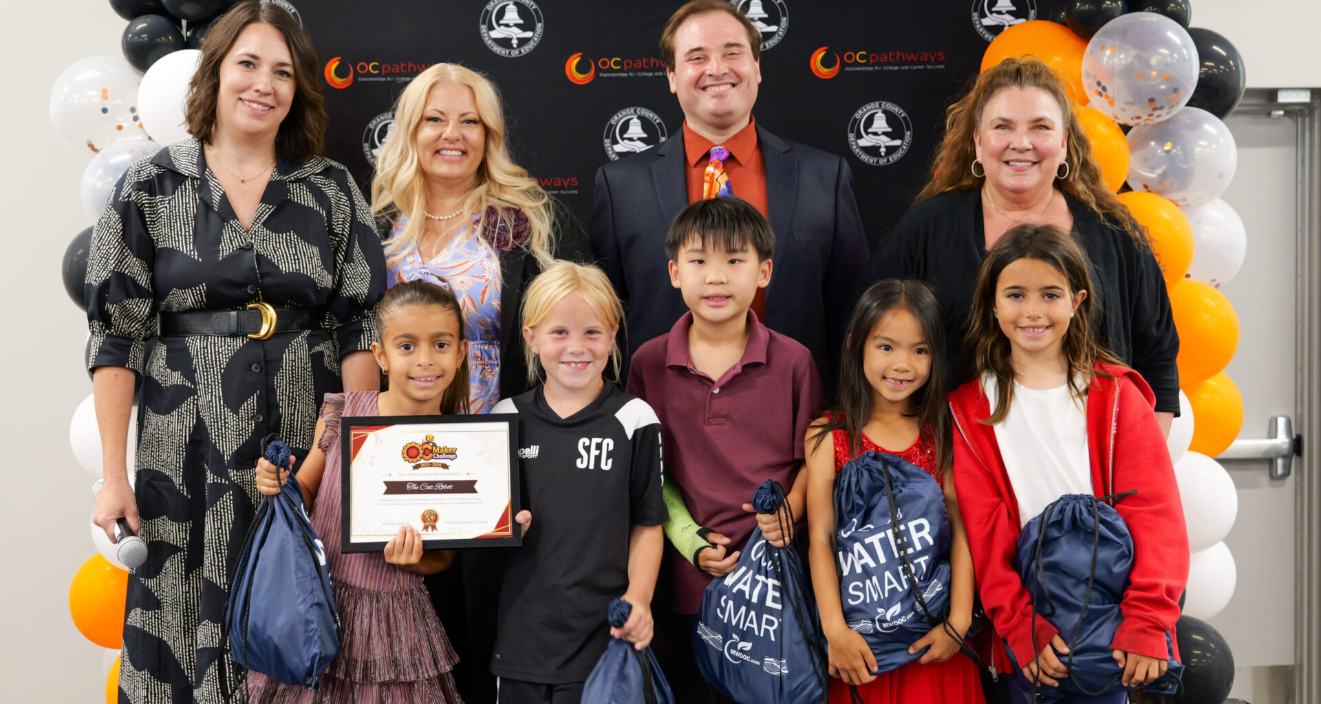 Dana Hills High School students Andre, Nicholas and Brandon win first place for their "Caged Dolphin Vape Detector" project at the annual ocMaker Challenge awards ceremony.
