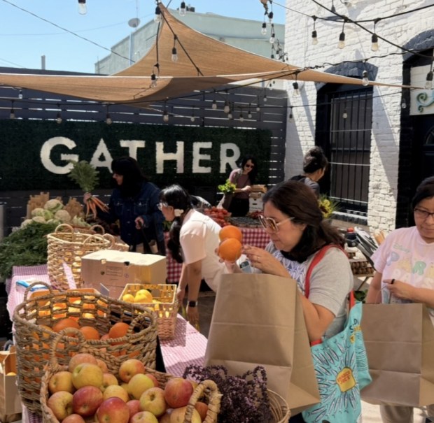 Despite securing enough funding to continue food distributions through December, the nonprofit organization behind the Altadena Farmers Market says it is facing a different challenge: finding the money to keep its staff working. (Courtesy)