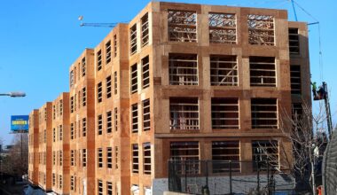 A rare site in Boston these days: Housing construction.