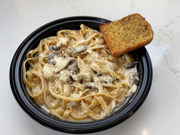 The fettuccini Alfredo pasta with chicken includes grilled chicken and mushrooms in the sauce. Every order is made fresh and can be adjusted for customer's preferences, such as leaving the mushrooms out. (Courtesy of Seniore's Pizza)
