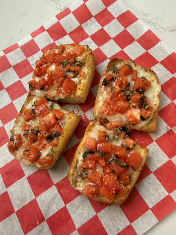 Although the Margherita mix at Seniore's Pizza is typically found on the baked penne pasta, customers can add the mix to anything they desire, such as this garlic bread with mozzarella cheese. For the recipe visit PBMonthly.net. (Courtesy of Seniore's Pizza)