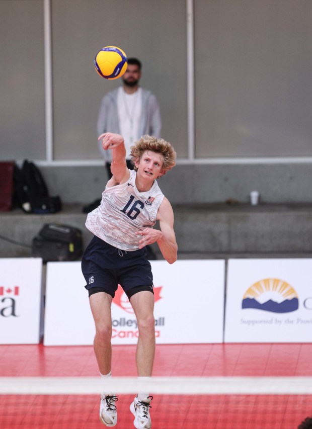 Daniel Hornyak, a Poway High junior, serves at a NORCECA Continental Championship game in British Columbia, Canada. After making it all the way to the finals with the USA team, he returned home to play in playoff games for Poway's volleyball and baseball teams. (Courtesy NORCECA)
