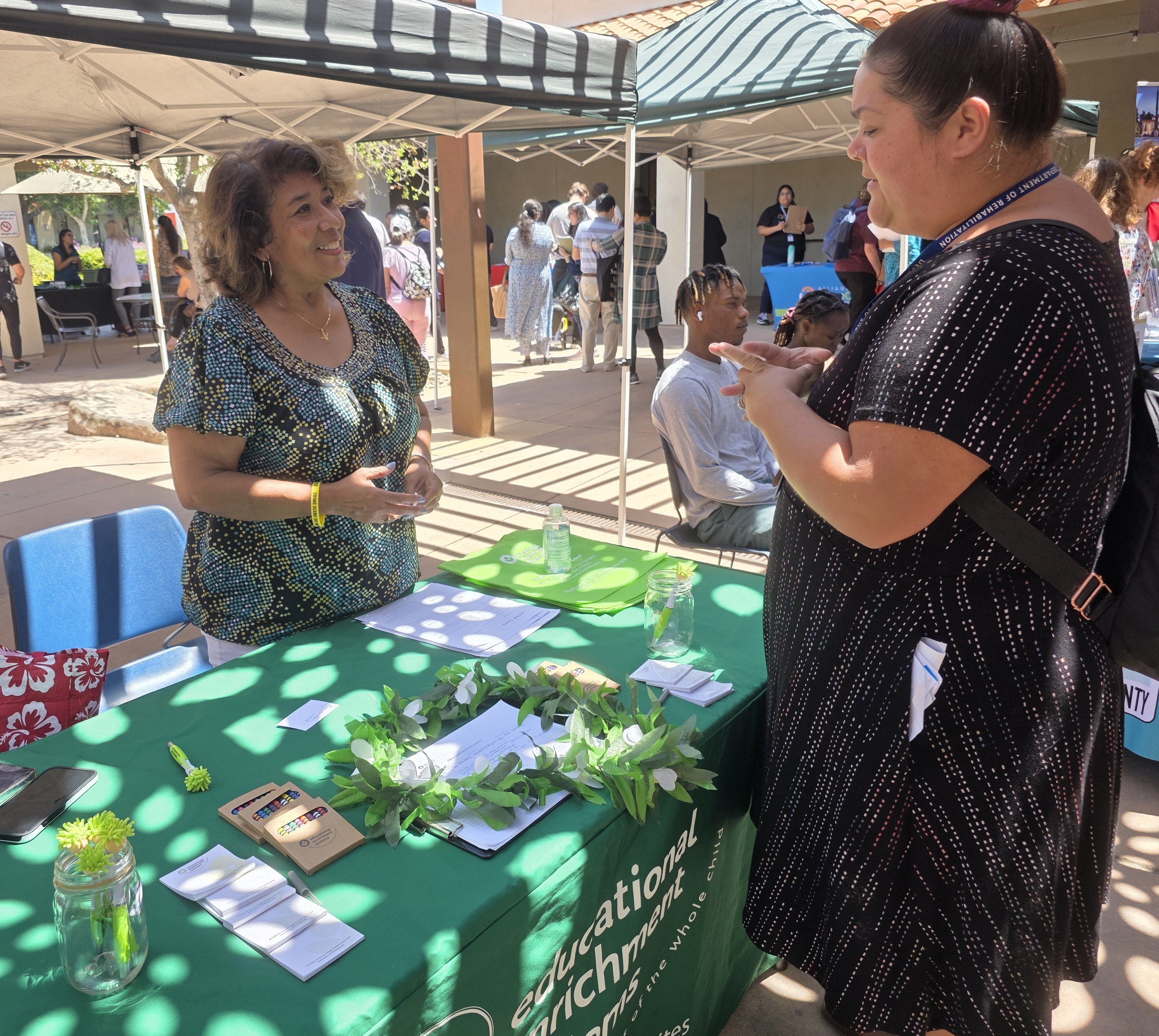 Sara Hernandez, left, represented Educational Enrichment Systems which was hiring...