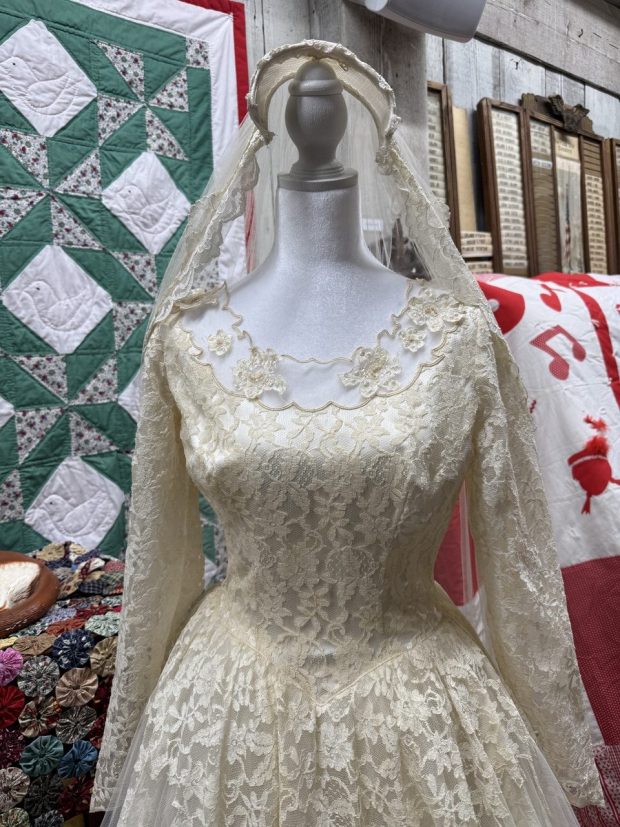 A close up of the details of one of the vintage wedding dresses on display. (Regina Elling)