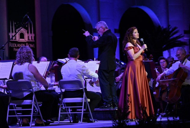 Vocalist Brooke DeRosa sings as Ransom Wilson conducts the Redlands Symphony Orchestra during the finale of the 102nd Summer Music Festival at the Redlands Bowl in Redlands on Friday, Aug. 15, 2025. (Photo by Terry Pierson, The Press-Enterprise/SCNG)