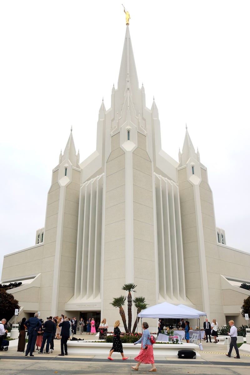 Members of the media walk around the newly renovated grounds at the San Diego California Temple on Monday, June 15, 2026.