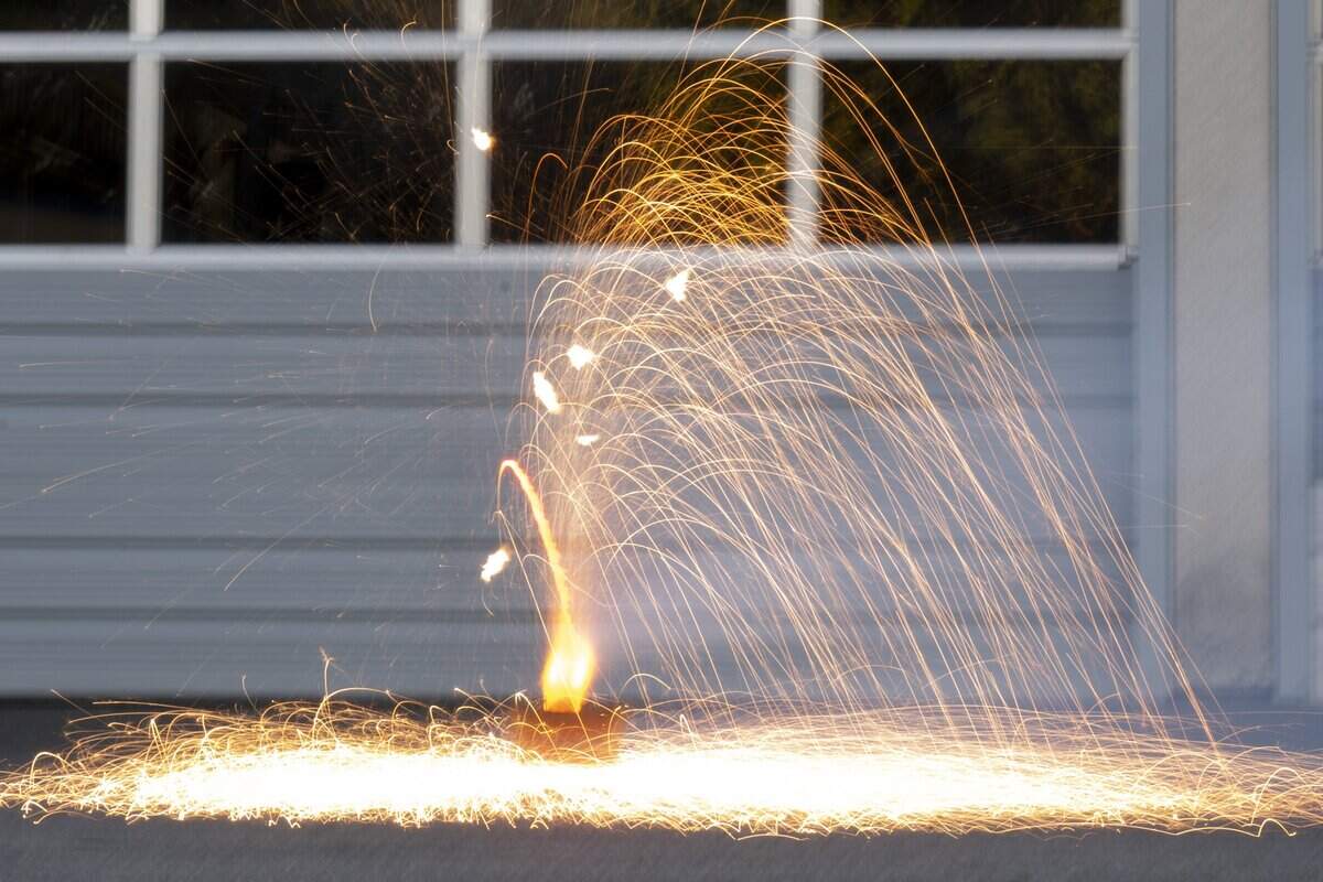 Phantom Fireworks’ Radioactive Spark firework sparkles in front of Sacramento Metro Fire Station 50 during the Sacramento Bee 2026 summer intern gathering to judge fireworks on Wednesday, June 24, 2026.