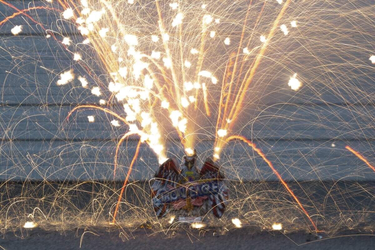 Phantom Fireworks’ Iron Eagle FTN firework sparkles in front of Sacramento Metro Fire Station 50 during the Sacramento Bee 2026 summer intern gathering to judge fireworks on Wednesday, June 24, 2026.