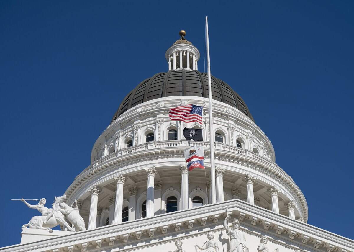 The Juneteenth flag blows in the wind with other flags at the California Capitol during a Juneteenth celebration hosted by the California Legislative Black Caucus on Wednesday, June 17, 2026.