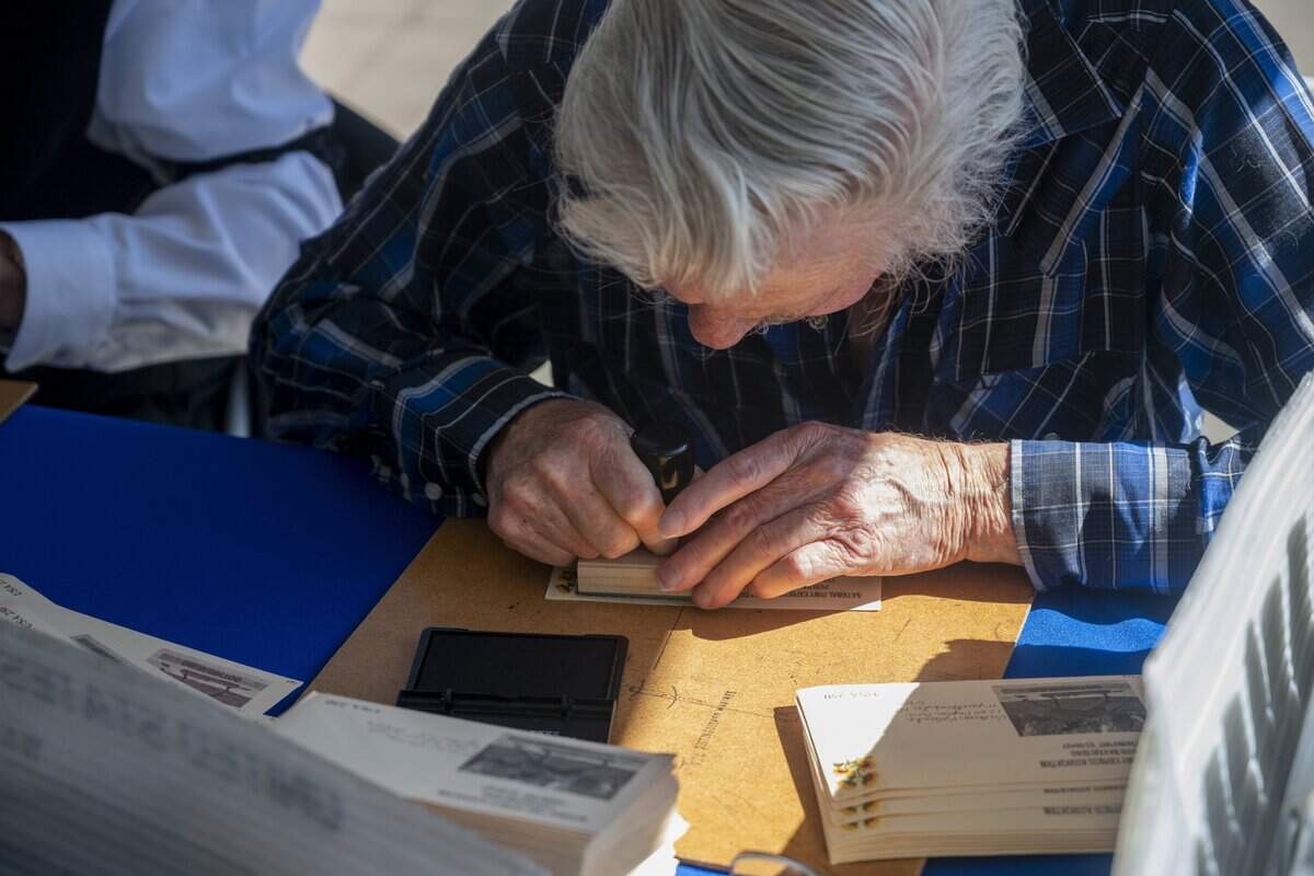 After arriving by horseback during the National Pony Express Association’s re-ride across the United States on Thursday, June 25, 2026, mail is stamped in Old Sacramento.