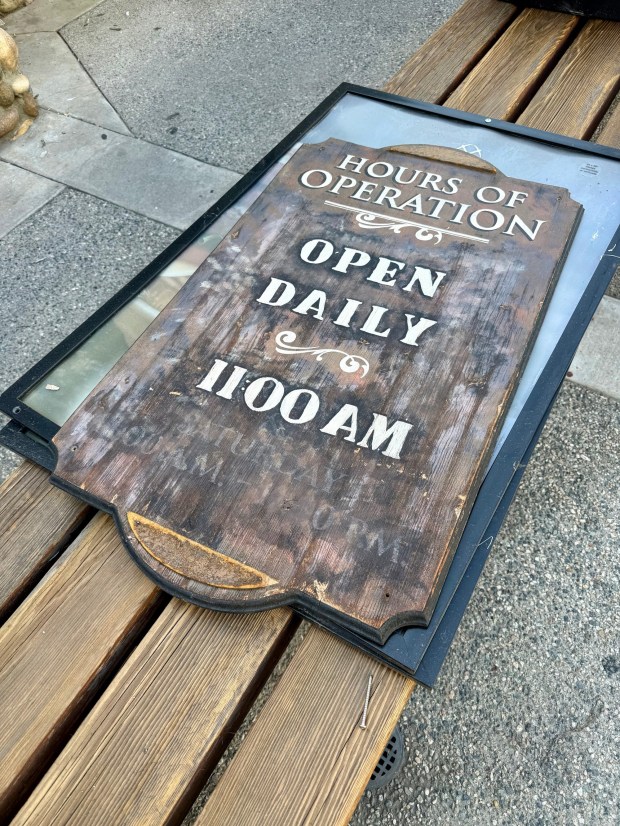 Claim Jumper signage removed by painters rests on a bench outside the San Bernardino restaurant, Wednesday, June 24, 2026. (Photo by Fielding Buck, The Press-Enterprise/SCNG)