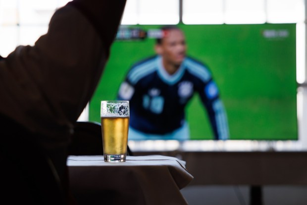 A glass of beer sits on a table during a World Cup match between Germany and Ecuador on Thursday, June 25, 2026, during a watch party at Teske's Germania in San Jose, Calif. (Dai Sugano/Bay Area News Group)