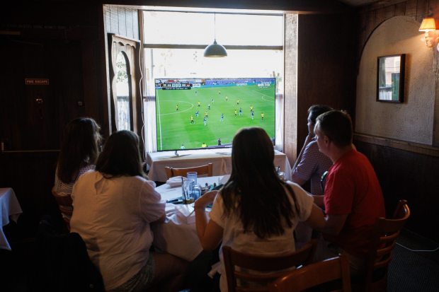 Customers watch a World Cup match between Germany and Ecuador on Thursday, June 25, 2026, during a watch party at Teske's Germania in San Jose, Calif. Ecuador defeated Germany 2-1. (Dai Sugano/Bay Area News Group)