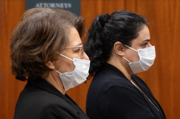 Shahin Gheblehshenas, left, and Nina Fathizadeh appear in the Santa Clara County Hall of Justice in San Jose, Calif., Wednesday, Dec. 6, 2023, for arraignment on child endangerment charges in the deaths of two toddlers at their home day care in October. (Karl Mondon/Bay Area News Group)