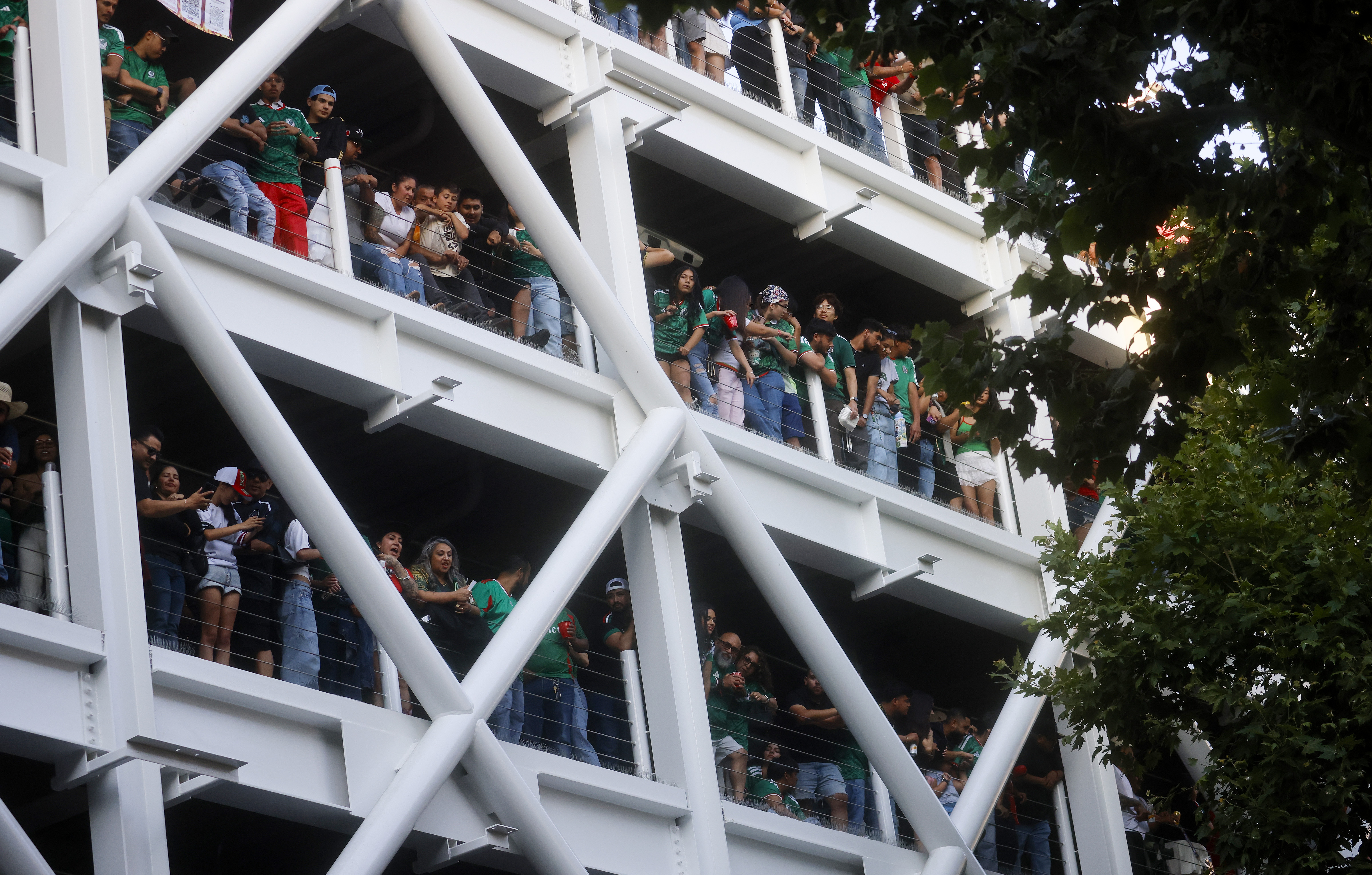 Soccer fans, mostly for Mexico, watch the Mexico versus the...