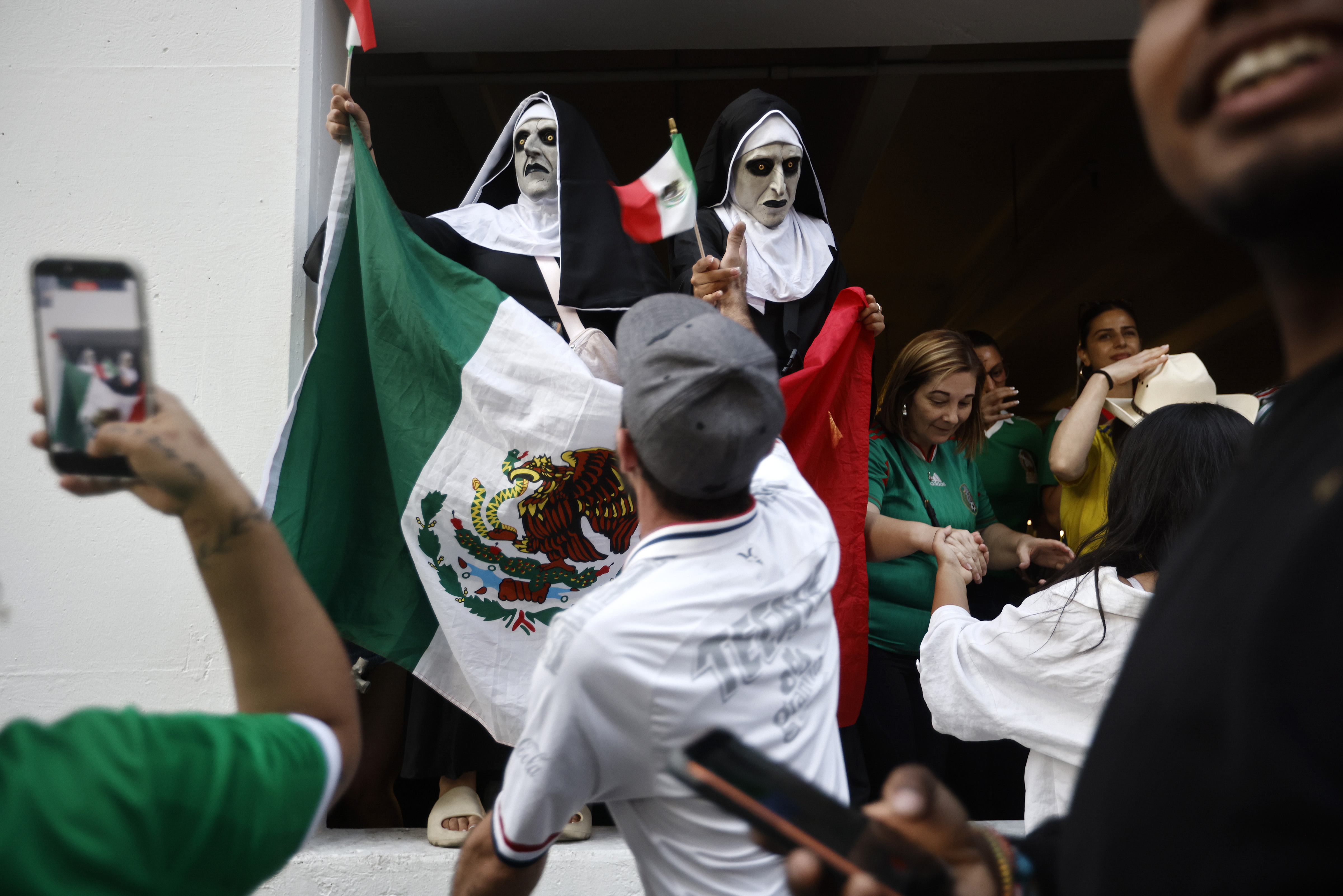 Mexico fans celebrate after Mexico beat the Korea Republic 1-0...