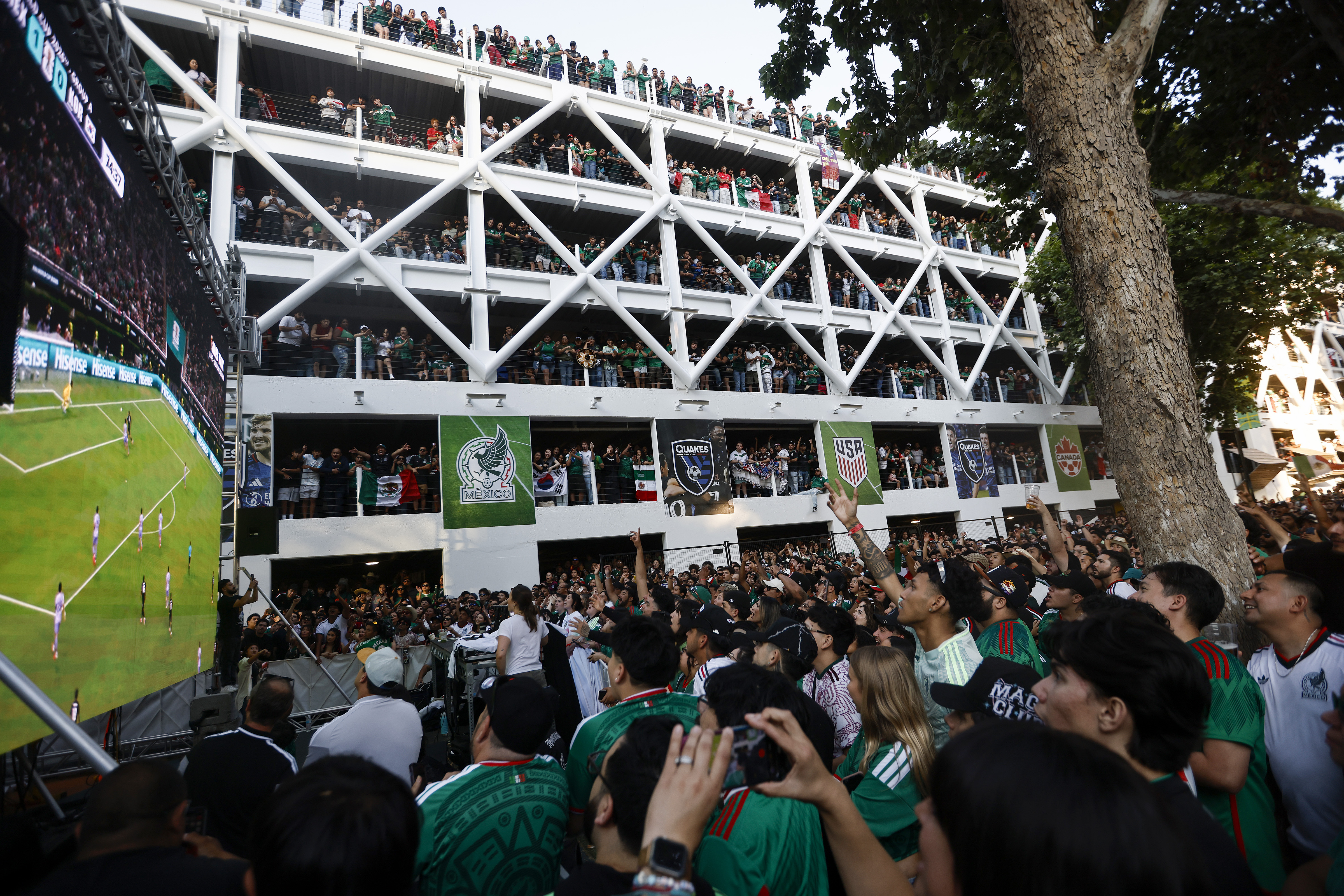 Soccer fans, mostly for Mexico, watch the Mexico versus the...