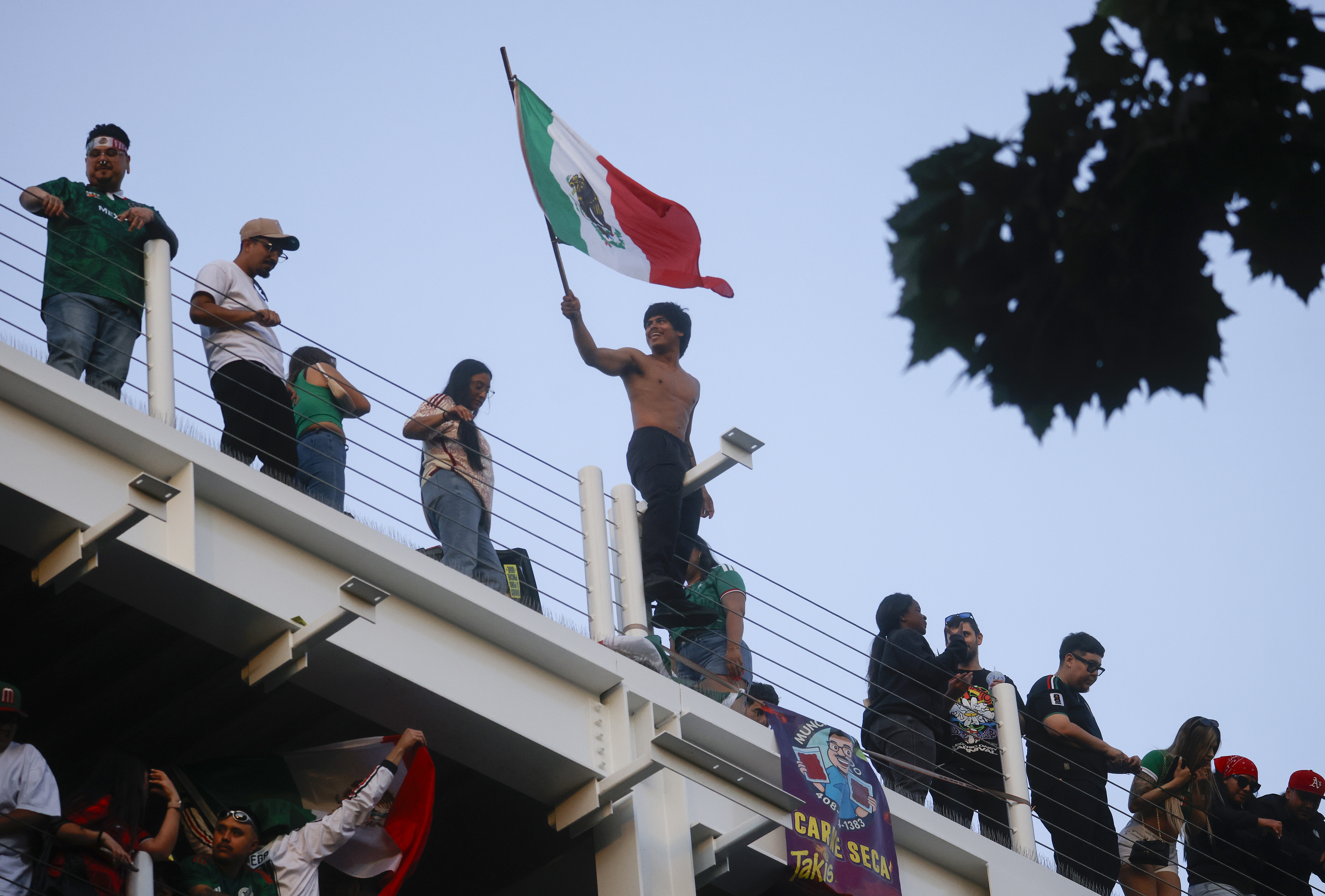 Mexico fans celebrate after Mexico beat the Korea Republic 1-0...