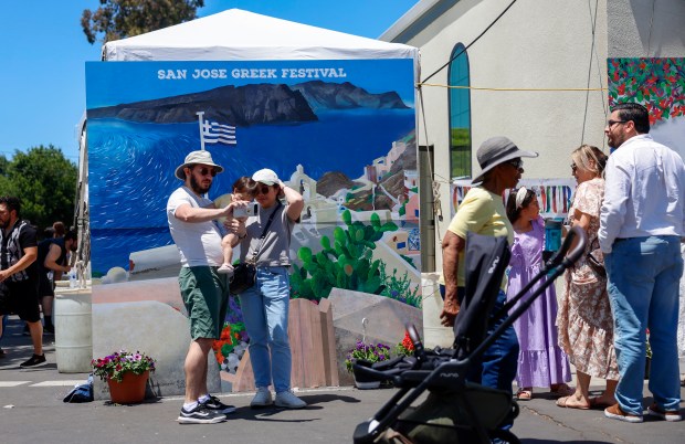 Attendees take photos at the San Jose Greek Festival at St. Nicholas Greek Orthodox Church in San Jose, Calif., on Sunday, May 31, 2026. (Nhat V. Meyer/Bay Area News Group)
