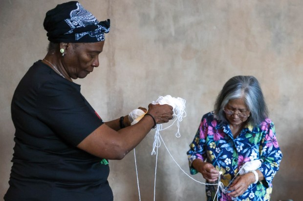 Lenora Morris, of San Jose, left, and Zeny Malonzo, of San Jose, right, untangle yarn at Seven Trees Community Center in San Jose, Calif., on Thursday, June 18, 2026. (Shae Hammond/Bay Area News Group)