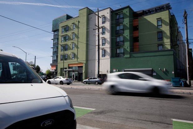 Cars drive past the Quetzal Gardens housing complex in East San Jose, March 26, 2026. (Dai Sugano/Bay Area News Group)