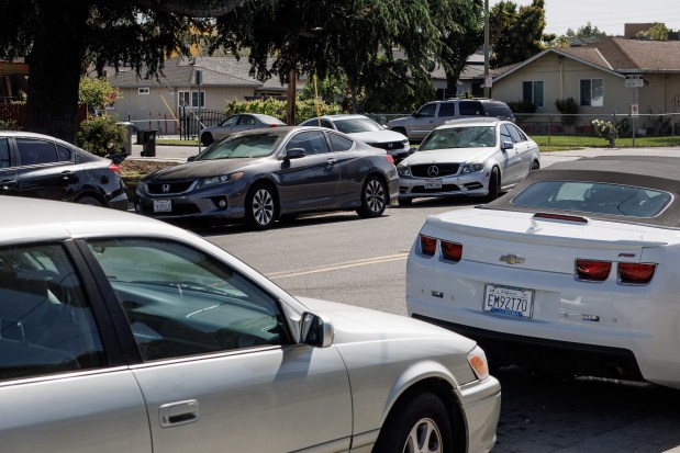 Cars are parked on Beverly Boulevard near the Quetzal Gardens housing complex in East San Jose, March 26, 2026. (Dai Sugano/Bay Area News Group)