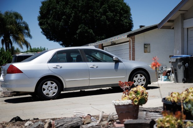 Crystal Calhoun's car, which she no longer drives, sits in her driveway, Friday, June 19, 2026, in San Jose, Calif. (Dai Sugano/Bay Area News Group)