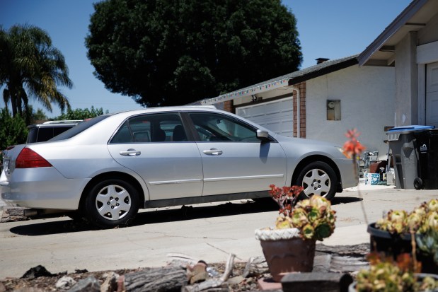 Crystal Calhoun's car, which she no longer drives, sits in her driveway, Friday, June 19, 2026, in San Jose, Calif. (Dai Sugano/Bay Area News Group)