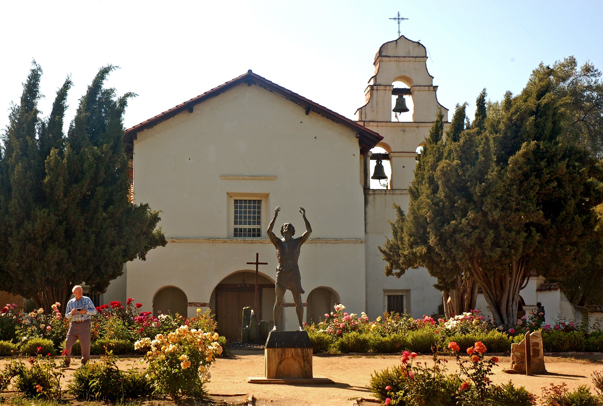 The garden is filled with roses at Mission San Juan...
