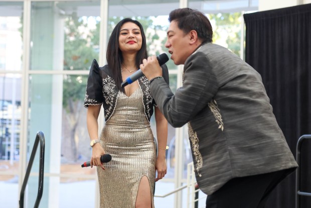 Arriane Del and Arvin Tristan Monfero sing during a celebration of Philippine Independence Day at San Jose City Hall in downtown San Jose, Calif., on Friday, June 12, 2026. (Shae Hammond/Bay Area News Group)