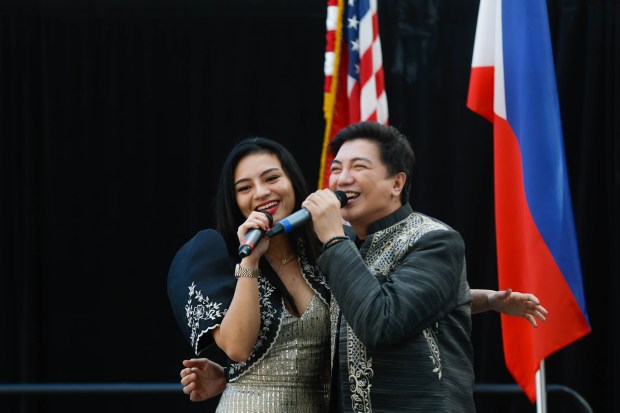 Arriane Del and Arvin Tristan Monfero sing during a celebration of Philippine Independence Day at San Jose City Hall in downtown San Jose, Calif., on Friday, June 12, 2026. (Shae Hammond/Bay Area News Group)