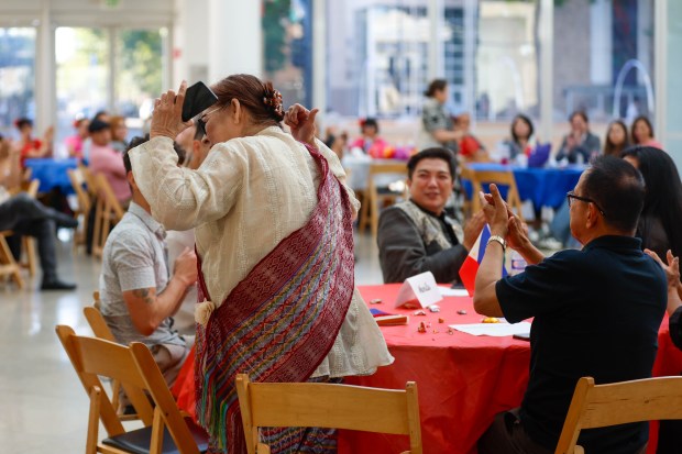 Evangeline Sangalang is cheered for after receiving a Certificate of Recognition during a celebration Philippine Independence Day at City Hall in downtown San Jose, Calif., on Friday, June 12, 2026. (Shae Hammond/Bay Area News Group)