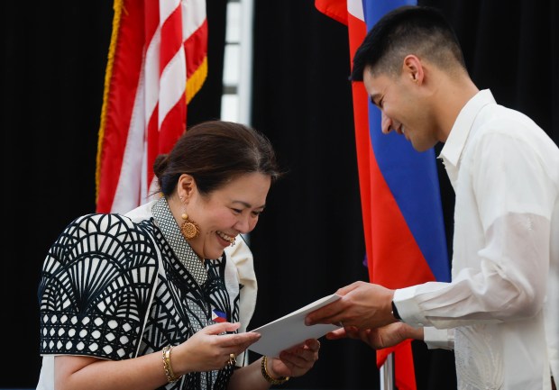 Councilmember Anthony Tordillos gives a Certificate of Recognition to Rose Wenceslao during a celebration of Philippine Independence Day at City Hall in downtown San Jose, Calif., on Friday, June 12, 2026. (Shae Hammond/Bay Area News Group)