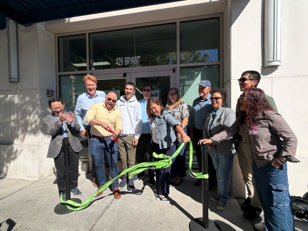 Palo Alto City Manager Ed Shikada, far left, applauds as Palo Alto Vice Mayor Greer Stone cuts the ribbon on the new Bryant Street Community Center on Wednesday, June 3, 2026. (Photo courtesy City of Palo Alto)