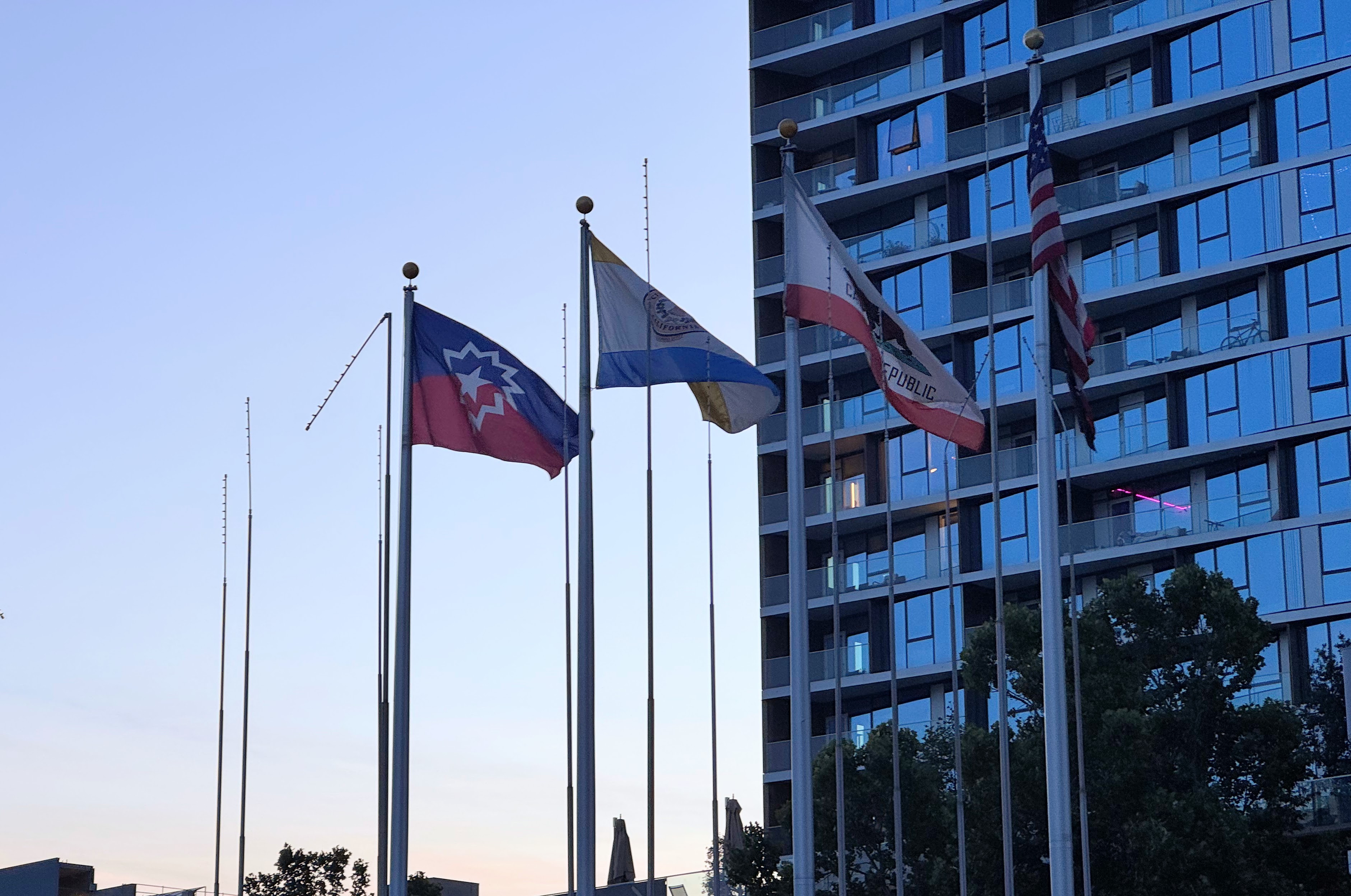 The Juneteenth flag, far left, was raised at San Jose...