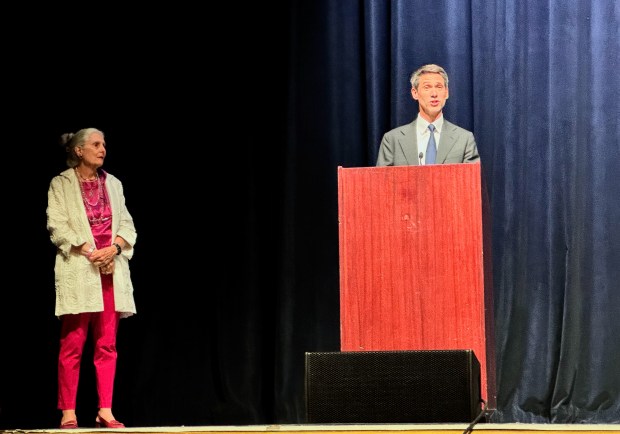 Gloria Duffy, left, watches as San Jose Mayor Matt Mahan delivers remarks during the celebration of life for her husband, Rod Diridon Sr., at the San Jose Civic Auditorium on Thursday, June 25, 2026. (Sal Pizarro/Bay Area News Group)