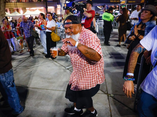 Esteban Vasquez, from San Jose, dances during the 35th annual San Jose Jazz Summer Fest at Plaza de Cesar Chavez in San Jose, Calif., on Friday, Aug. 8, 2025. (Shae Hammond/Bay Area News Group)