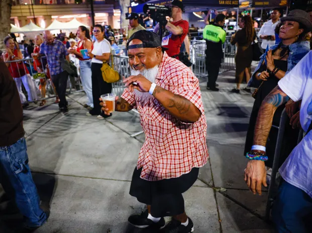 Esteban Vasquez, from San Jose, dances during the 35th annual San Jose Jazz Summer Fest at Plaza de Cesar Chavez in San Jose, Calif., on Friday, Aug. 8, 2025. (Shae Hammond/Bay Area News Group)