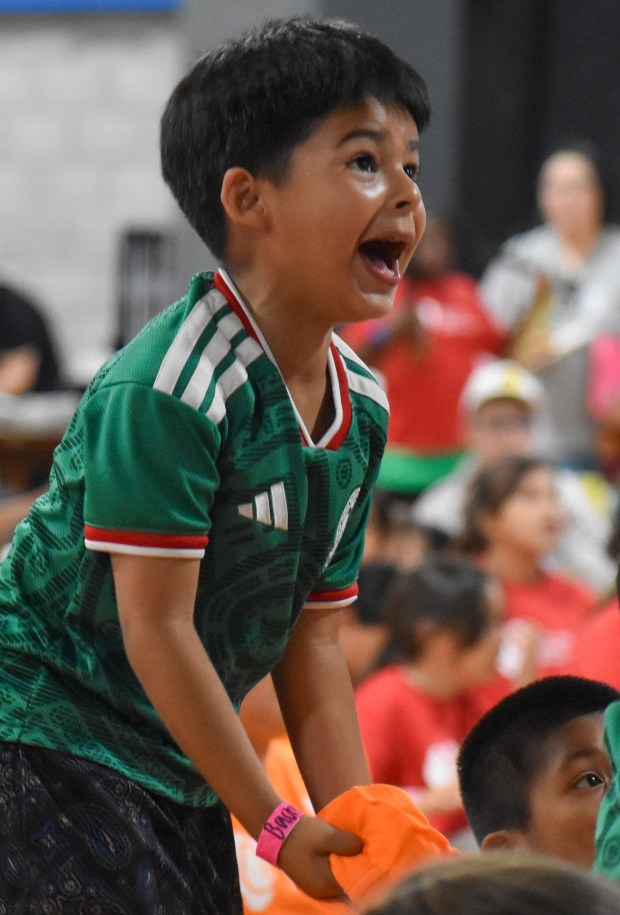 A student cheers on team Mexico as its plays its World Cup opener during a San Jose Unified School District event at the Plex in San Jose on June 11, 2026. (Ekasha Sikka/Mosaic)