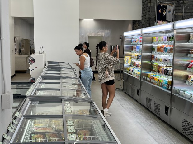 Ashley Long (L) and Lia Cortes (R) shop in the newly opened Sakura Market at the corner of South First Street and the Paseo de San Antonio in downtown San Jose, seen on June 24, 2026.(George Avalos/Bay Area News Group)