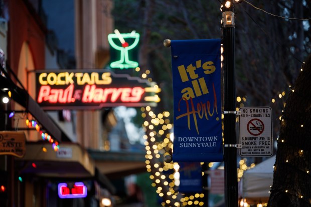 Banners and neon signs are displayed along historic Murphy Avenue in downtown Sunnyvale on April 3, 2026. (Dai Sugano/Bay Area News Group)