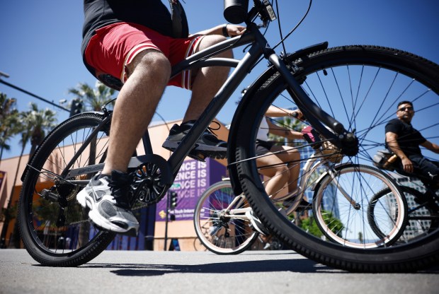 People ride north past The Tech Interactive on South Market Street during Viva CalleSJ's "Greetings from San Jose" in downtown San Jose, Calif., on Sunday, June 14, 2026. (Nhat V. Meyer/Bay Area News Group)